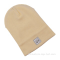 100% acryl kids beanie hoed met lederen patch